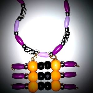 Purple, black and yellow wood bead native American like necklace